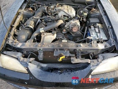 Zdjęcie 11 z 11 samochodu: 1997 FORD MUSTANG VIN:1FALP444XVF151502 - miniatura