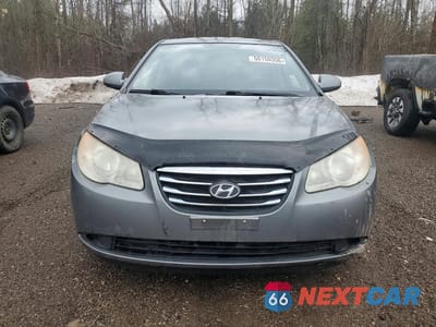 Piąte zdjęcie samochodu w środku: 2010 HYUNDAI ELANTRA BLUE VIN:KMHDU4BD9AU086654 - miniatura