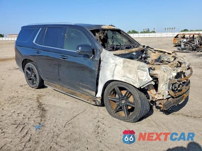 Czwarte zdjęcie samochodu z boku: 2021 CHEVROLET TAHOE C1500 LT VIN:1GNSCNKD6MR155352 - miniatura