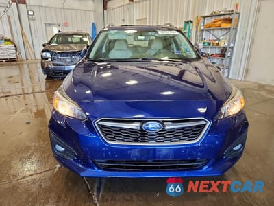 Piąte zdjęcie samochodu w środku: 2017 SUBARU IMPREZA PREMIUM PLUS VIN:4S3GTAD69H3706551 - miniatura