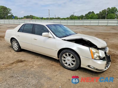 Czwarte zdjęcie samochodu z boku: 2010 CADILLAC DTS VIN:1G6KA5EY5AU108449 - miniatura
