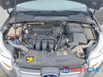 Zdjęcie 11 z 12 samochodu: 2014 FORD FOCUS SE VIN:1FADP3F20EL438083 - miniatura