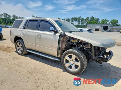 Czwarte zdjęcie samochodu z boku: 2015 CHEVROLET TAHOE C1500 LTZ VIN:1GNSCCKC8FR246220 - miniatura