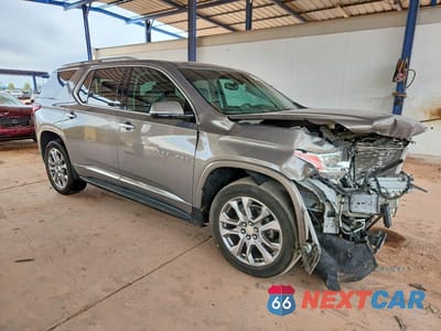 Czwarte zdjęcie samochodu z boku: 2018 CHEVROLET TRAVERSE PREMIER VIN:1GNERKKW4JJ142511 - miniatura