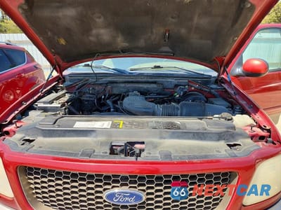Zdjęcie 11 z 12 samochodu: 2001 FORD F150 VIN:1FTRF18L11NB46258 - miniatura