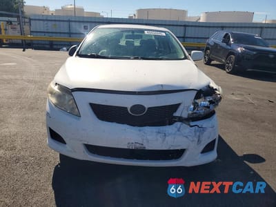 Piąte zdjęcie samochodu w środku: 2009 TOYOTA COROLLA LE VIN:JTDBL40E099023659 - miniatura
