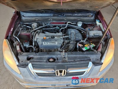 Zdjęcie 12 z 12 samochodu: 2003 HONDA CR-V LX VIN:JHLRD68473C016952 - miniatura