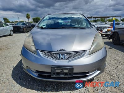 Piąte zdjęcie samochodu w środku: 2010 HONDA FIT VIN:JHMGE8G25AC013623 - miniatura