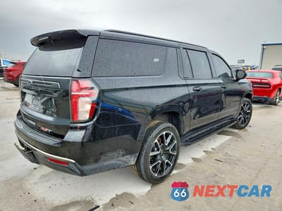 Trzecie zdjęcie samochodu z tyłu: 2021 CHEVROLET SUBURBAN C1500 RST VIN:1GNSCEKD4MR190813 - miniatura