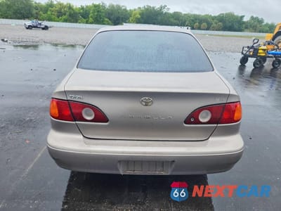 Zdjęcie 6 z 12 samochodu: 2001 TOYOTA COROLLA LE VIN:1NXBR12E51Z492401 - miniatura