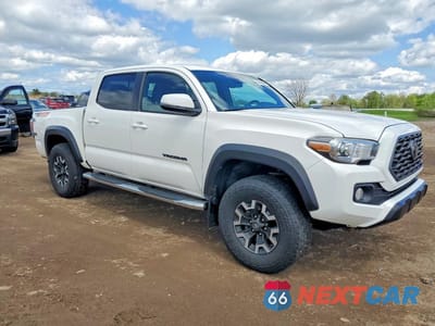 Czwarte zdjęcie samochodu z boku: 2020 TOYOTA TACOMA TRD OFF-ROAD VIN:3TMCZ5AN8LM368860 - miniatura