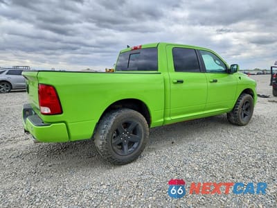 Trzecie zdjęcie samochodu z tyłu: 2018 RAM 1500 SLT VIN:1C6RR7LM9JS316627 - miniatura