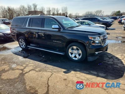 Czwarte zdjęcie samochodu z boku: 2015 CHEVROLET SUBURBAN K1500 LTZ VIN:1GNSKKKCXFR549870 - miniatura