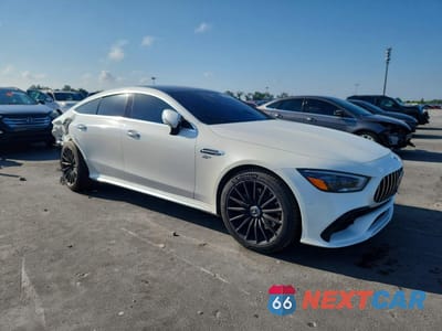 Czwarte zdjęcie samochodu z boku: 2021 MERCEDES-BENZ AMG GT 43 VIN:W1K7X5KB8MA042556 - miniatura
