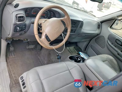 Zdjęcie 8 z 12 samochodu: 2002 FORD F150 SUPERCREW VIN:1FTRW08L62KB57110 - miniatura