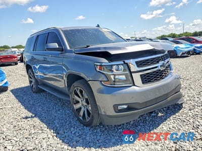 Czwarte zdjęcie samochodu z boku: 2018 CHEVROLET TAHOE C1500 LT VIN:1GNSCBKC3JR399493 - miniatura