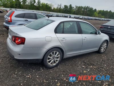 Trzecie zdjęcie samochodu z tyłu: 2010 VOLKSWAGEN JETTA VIN:3VWAZ7AJ5AM127123 - miniatura