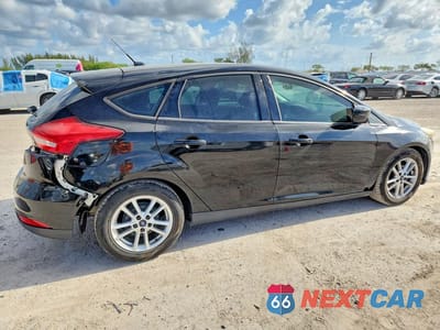 Trzecie zdjęcie samochodu z tyłu: 2016 FORD FOCUS SE VIN:1FADP3K25GL383848 - miniatura