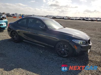 Czwarte zdjęcie samochodu z boku: 2016 BMW M235XI VIN:WBA1J9C58GV696629 - miniatura