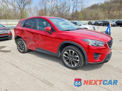 Czwarte zdjęcie samochodu z boku: 2016 MAZDA CX-5 GT VIN:JM3KE4DY4G0604878 - miniatura