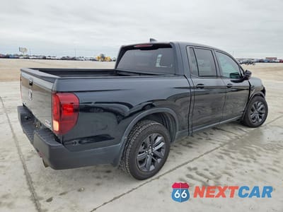 Trzecie zdjęcie samochodu z tyłu: 2021 HONDA RIDGELINE SPORT VIN:5FPYK3F10MB020603 - miniatura