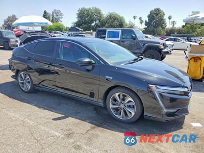 Czwarte zdjęcie samochodu z boku: 2018 HONDA CLARITY TOURING VIN:JHMZC5F32JC006930 - miniatura