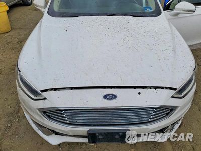 Zdjęcie 11 z 12 samochodu: 2018 FORD FUSION SE HYBRID VIN:3FA6P0LU6JR118744 - miniatura