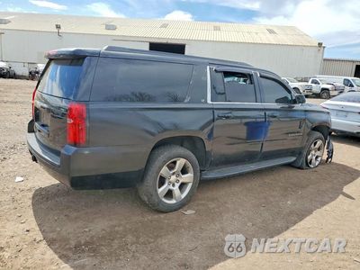 Trzecie zdjęcie samochodu z tyłu: 2017 CHEVROLET SUBURBAN K1500 LT VIN:1GNSKHKC3HR172126 - miniatura