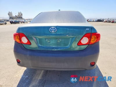 Zdjęcie 6 z 11 samochodu: 2010 TOYOTA COROLLA LE VIN:1NXBU4EE1AZ206426 - miniatura