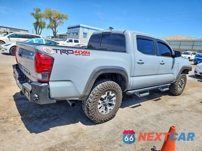 Trzecie zdjęcie samochodu z tyłu: 2018 TOYOTA TACOMA TRD OFF-ROAD VIN:3TMCZ5AN2JM184642 - miniatura
