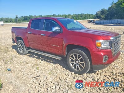 Czwarte zdjęcie samochodu z boku: 2022 GMC CANYON DENALI VIN:1GTG6EENXN1103667 - miniatura