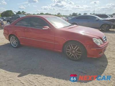 Czwarte zdjęcie samochodu z boku: 2009 MERCEDES-BENZ CLK 350 VIN:WDBTJ56H99F264993 - miniatura