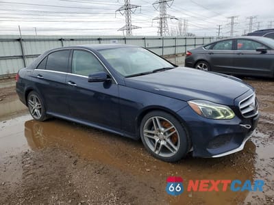 Czwarte zdjęcie samochodu z boku: 2014 MERCEDES-BENZ E 350 4MATIC VIN:WDDHF8JB2EA915021 - miniatura