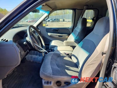 Zdjęcie 7 z 12 samochodu: 1999 FORD F150 VIN:2FTRX08W1XCA16951 - miniatura