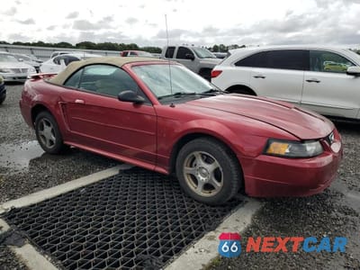Czwarte zdjęcie samochodu z boku: 2003 FORD MUSTANG V6 COUPE VIN:1FAFP44463F450057 - miniatura