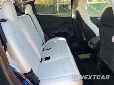 Zdjęcie 10 z 12 samochodu: 2023 TESLA MODEL Y VIN:7SAYGDEF7PF816625 - miniatura