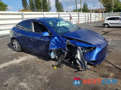 Czwarte zdjęcie samochodu z boku: 2020 TESLA MODEL Y VIN:5YJYGDEE5LF010250 - miniatura
