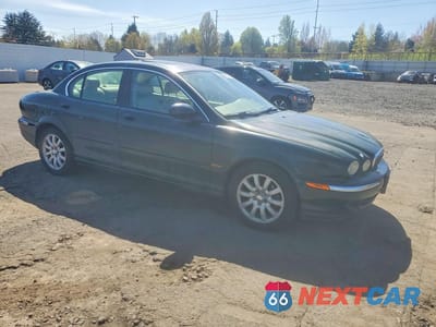 Czwarte zdjęcie samochodu z boku: 2003 JAGUAR X-TYPE 2.5 VIN:SAJEA51D03XD13955 - miniatura