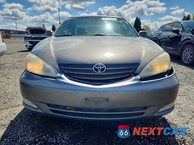 Piąte zdjęcie samochodu w środku: 2003 TOYOTA CAMRY XLE VIN:4T1BE30K93U708625 - miniatura