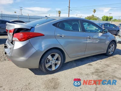 Trzecie zdjęcie samochodu z tyłu: 2013 HYUNDAI ELANTRA GLS VIN:KMHDH4AE0DU902976 - miniatura