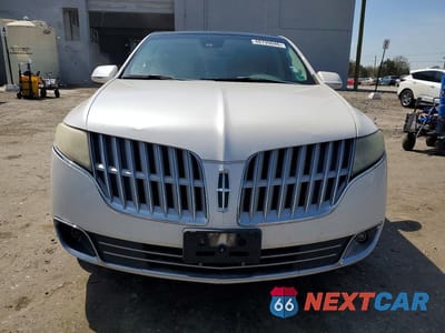 Piąte zdjęcie samochodu w środku: 2011 LINCOLN MKT VIN:2LMHJ5ATXBBJ54769 - miniatura