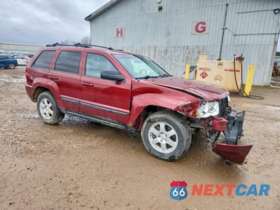 Czwarte zdjęcie samochodu z boku: 2009 JEEP GRAND CHEROKEE LAREDO VIN:1J8GR48K39C507318 - miniatura