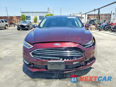 Piąte zdjęcie samochodu w środku: 2017 FORD FUSION TITANIUM PHEV VIN:3FA6P0SUXHR275799 - miniatura