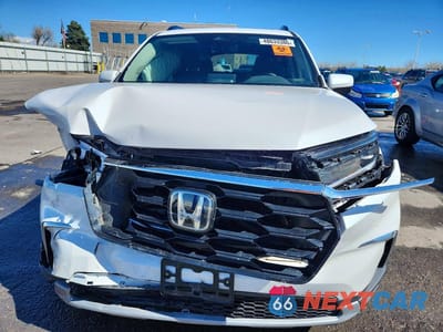 Piąte zdjęcie samochodu w środku: 2025 HONDA PILOT TOURING VIN:5FNYG1H78SB111387 - miniatura