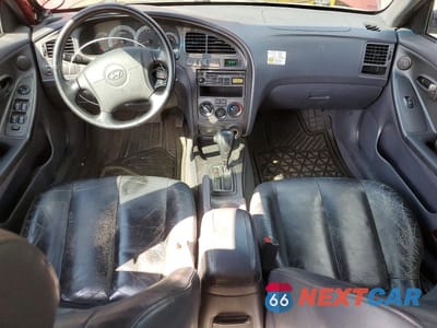 Zdjęcie 8 z 11 samochodu: 2003 HYUNDAI ELANTRA GT VIN:KMHDN55DX3U083523 - miniatura