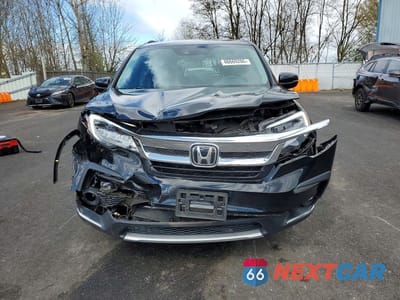 Piąte zdjęcie samochodu w środku: 2019 HONDA PILOT TOURING VIN:5FNYF6H60KB012523 - miniatura