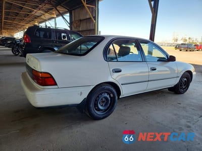 Trzecie zdjęcie samochodu z tyłu: 1995 TOYOTA COROLLA DX VIN:1NXAE09B0SZ312417 - miniatura