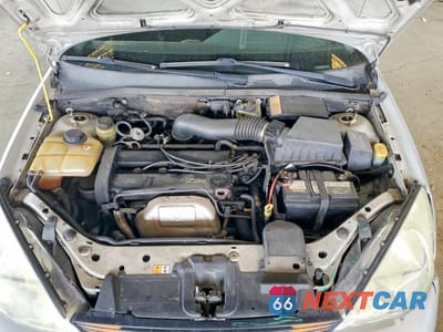 Zdjęcie 11 z 12 samochodu: 2002 FORD FOCUS SE VIN:1FAFP34312W172328 - miniatura