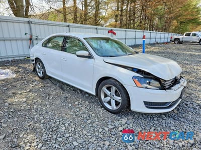 Czwarte zdjęcie samochodu z boku: 2015 VOLKSWAGEN PASSAT SE VIN:1VWBV7A38FC045476 - miniatura