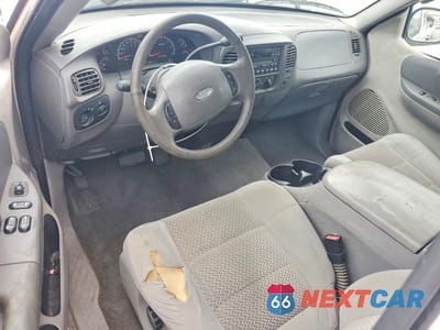 Zdjęcie 8 z 12 samochodu: 2003 FORD F150 VIN:1FTRX17213NA22256 - miniatura
